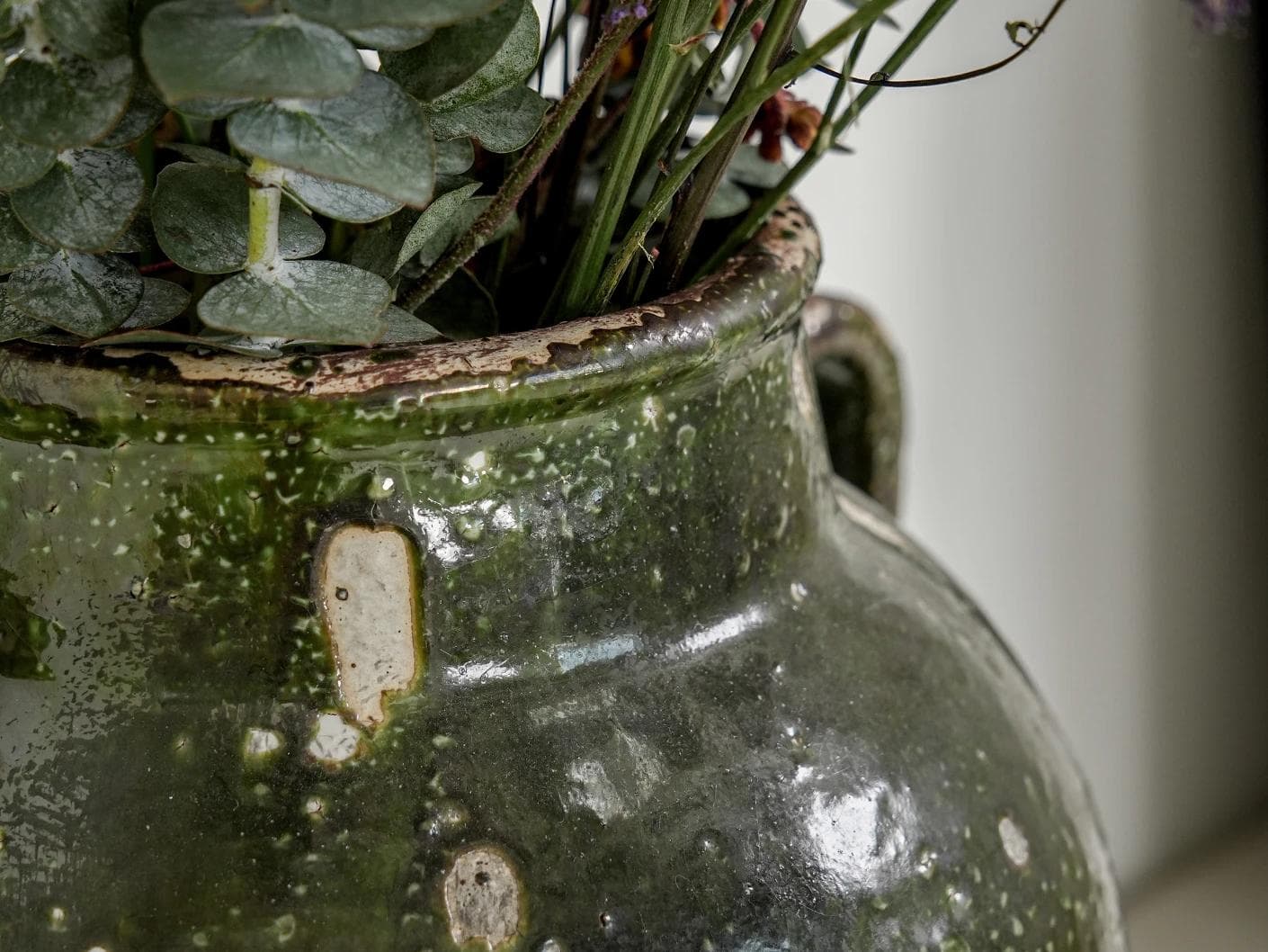 Nilsa Terra vases in deep olive and green, shown in a lifestyle close-up as image 4