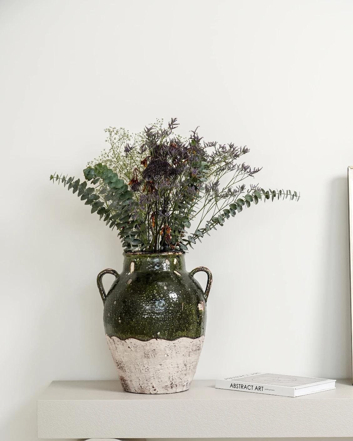 Nilsa Terra vases in deep olive and green, shown in a lifestyle front view as image 6