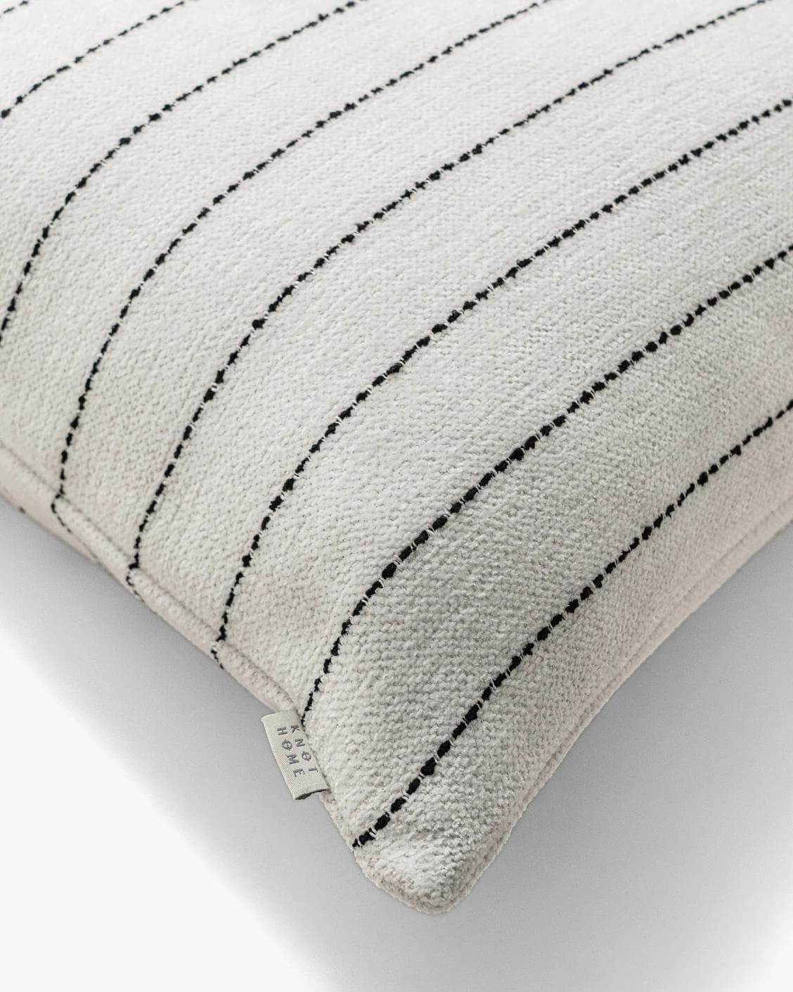 Noa Bianca cushion in black and ivory, shown in a product top view as image 8