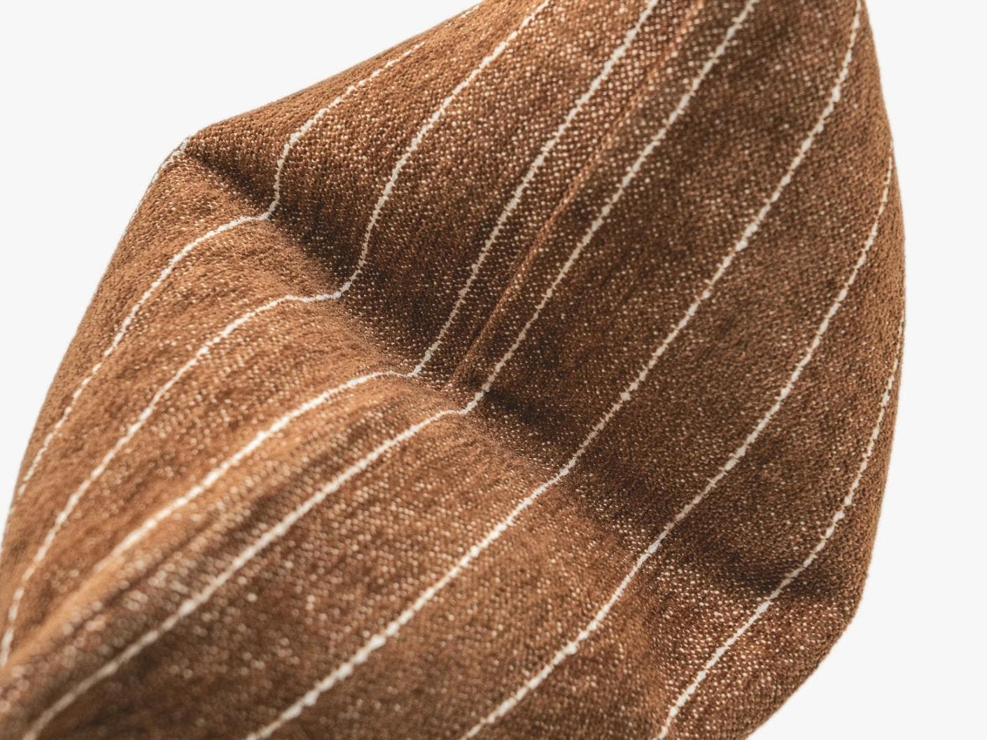 Noa Rust cushion in white and brown, shown in a product top view as image 11