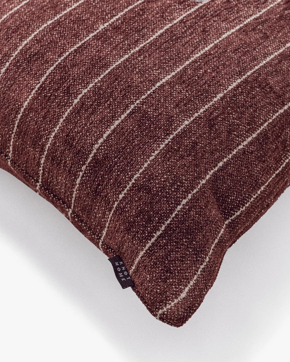 Noa Scarlet III cushion in burgundy, shown in a product close-up top view as image 6