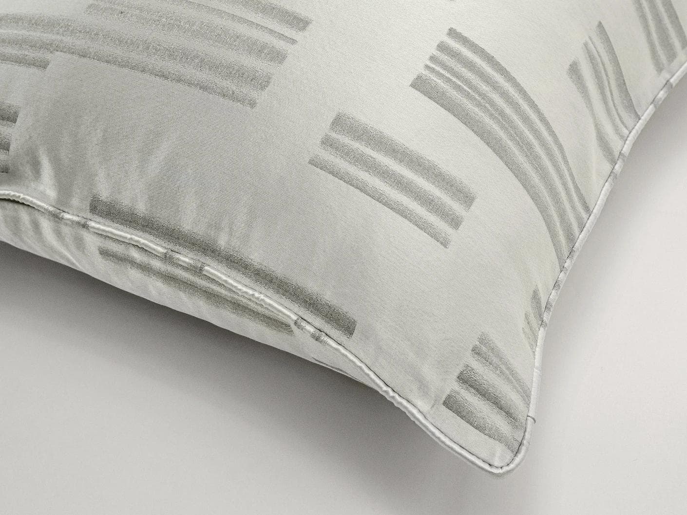 Nolan Laurent cushion in silver and grey, shown in a product top view as image 6
