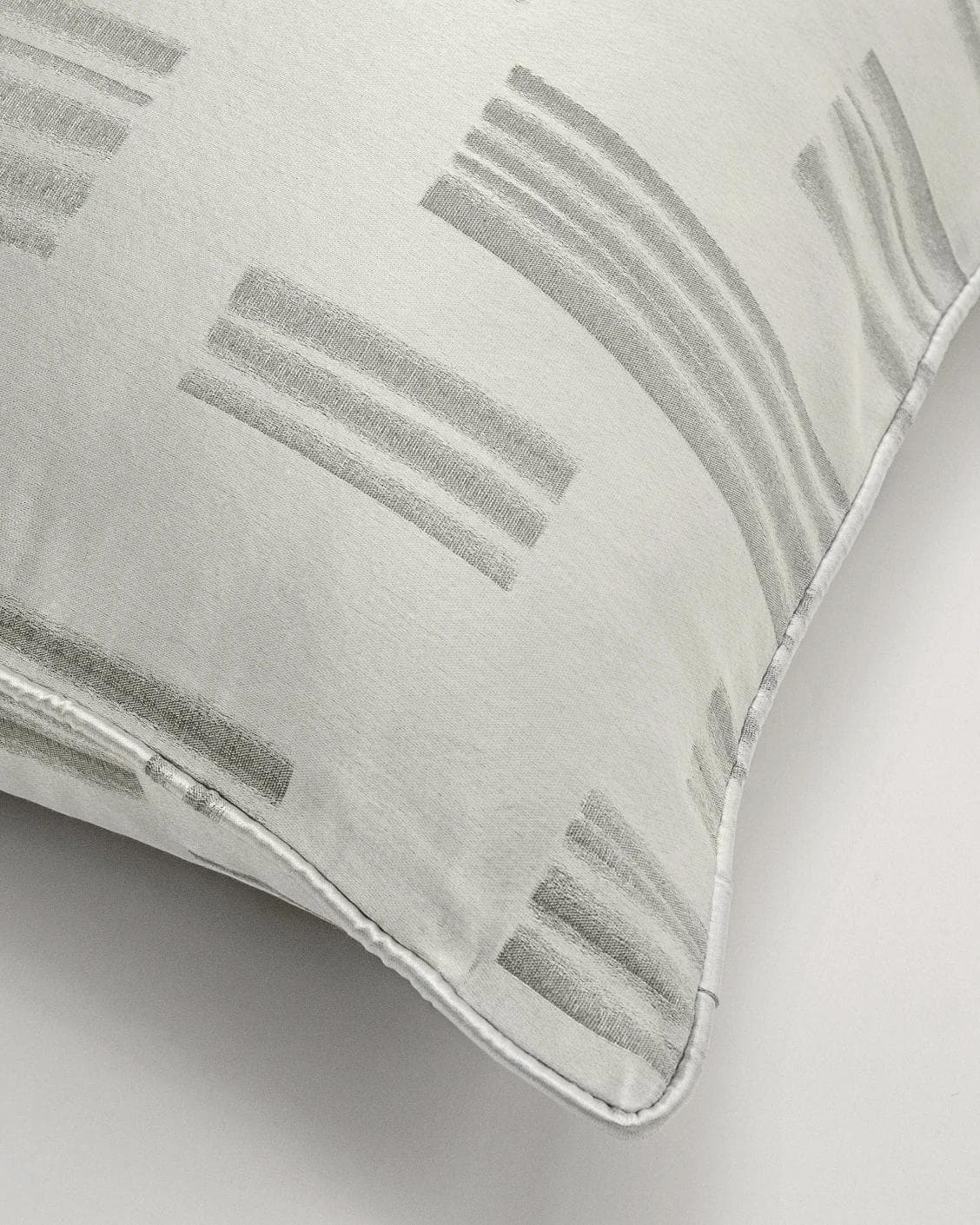 Nolan Laurent cushion in silver and grey, shown in a product top view as image 6