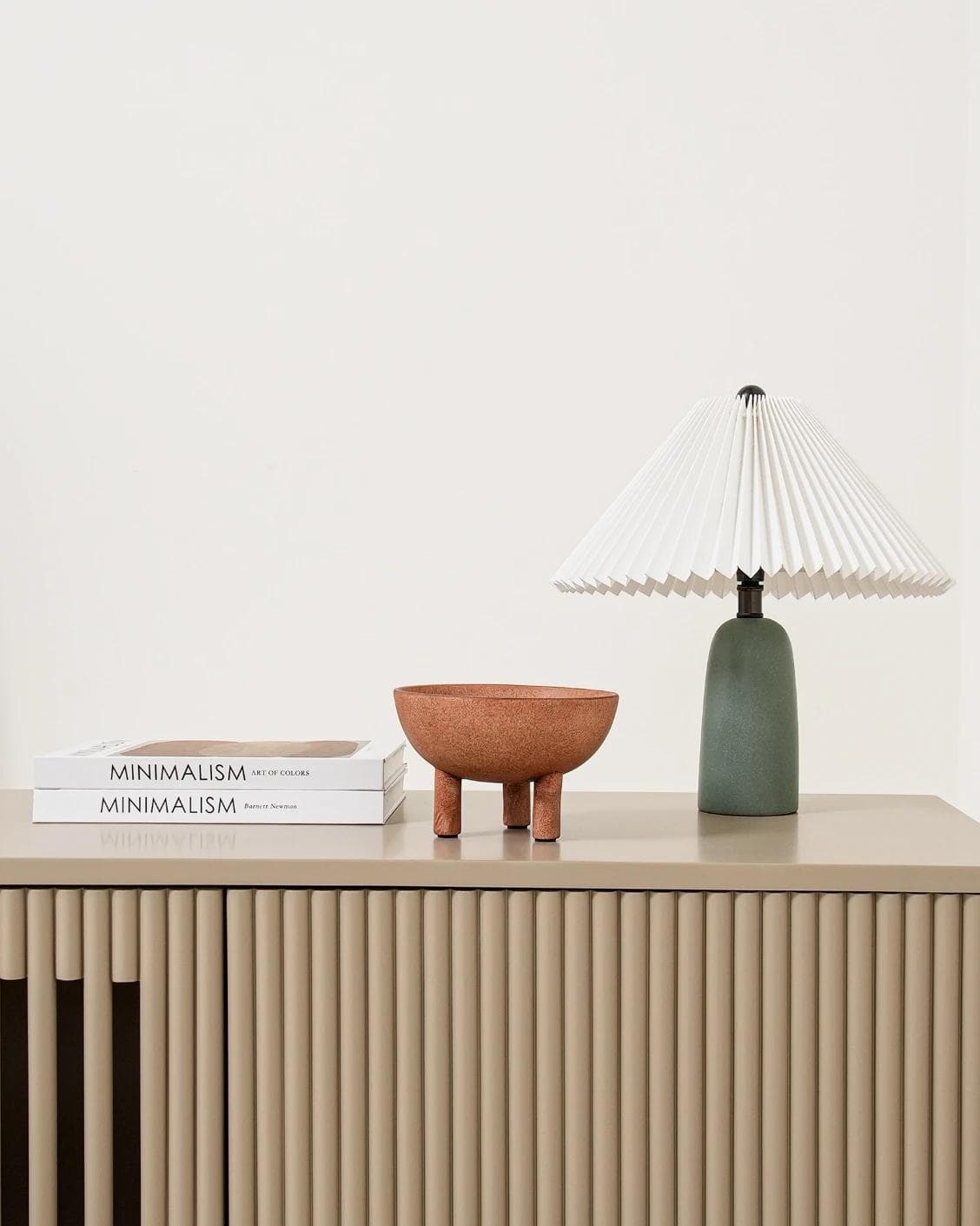 Nuva Terra bowls in orange, shown in a lifestyle front view as image 4