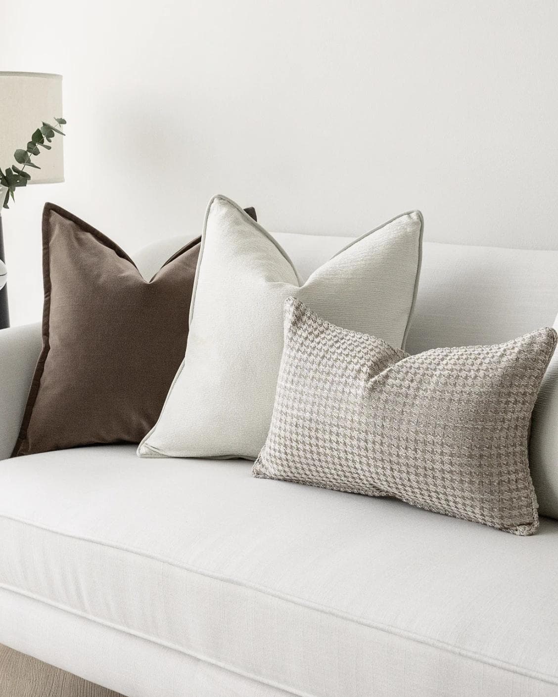 Oliver Bundle cushion in brown, white and silver, shown in a product right view as image 6
