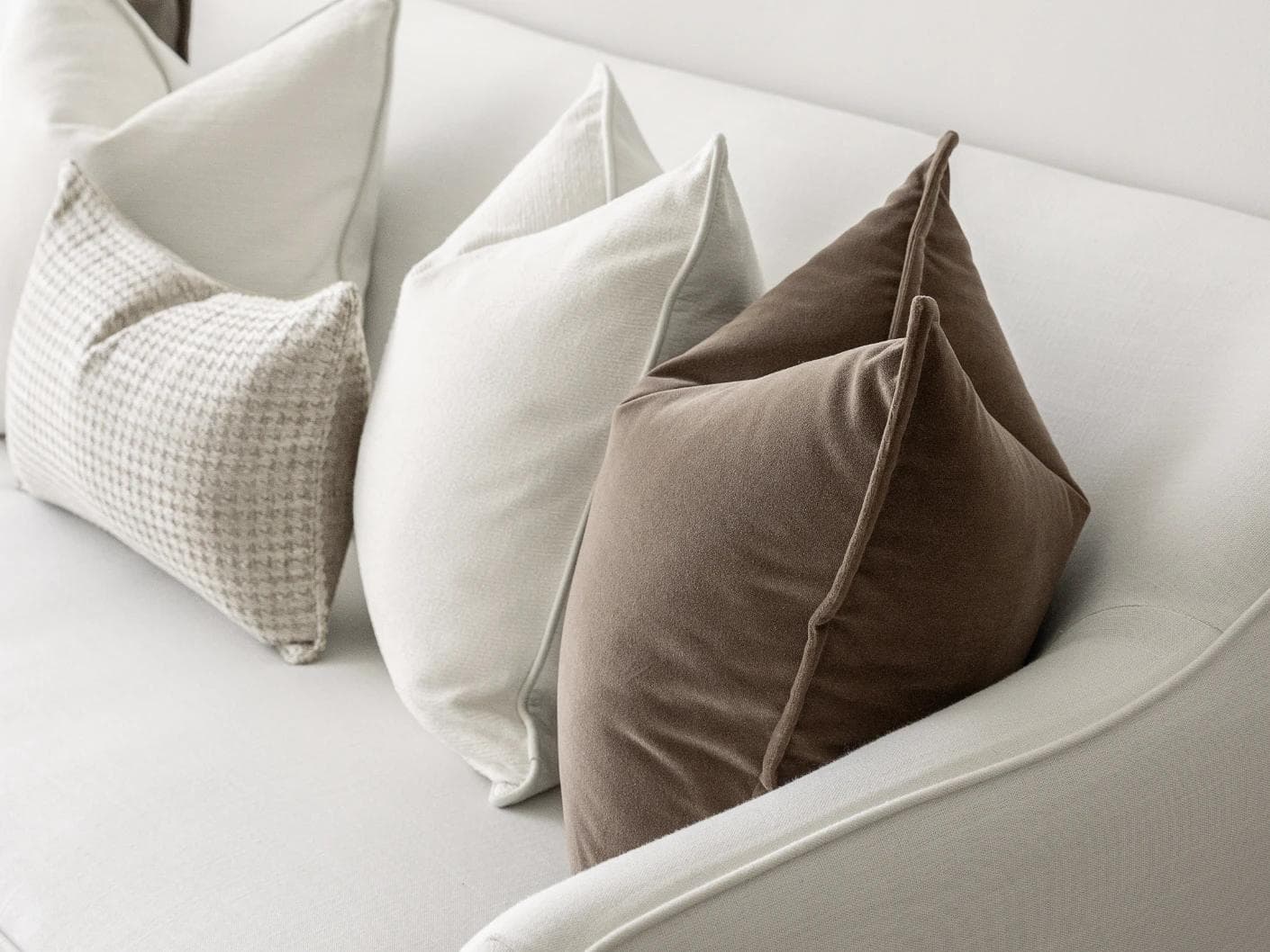 Oliver Bundle cushion in brown, white and silver, shown in a product right view as image 7