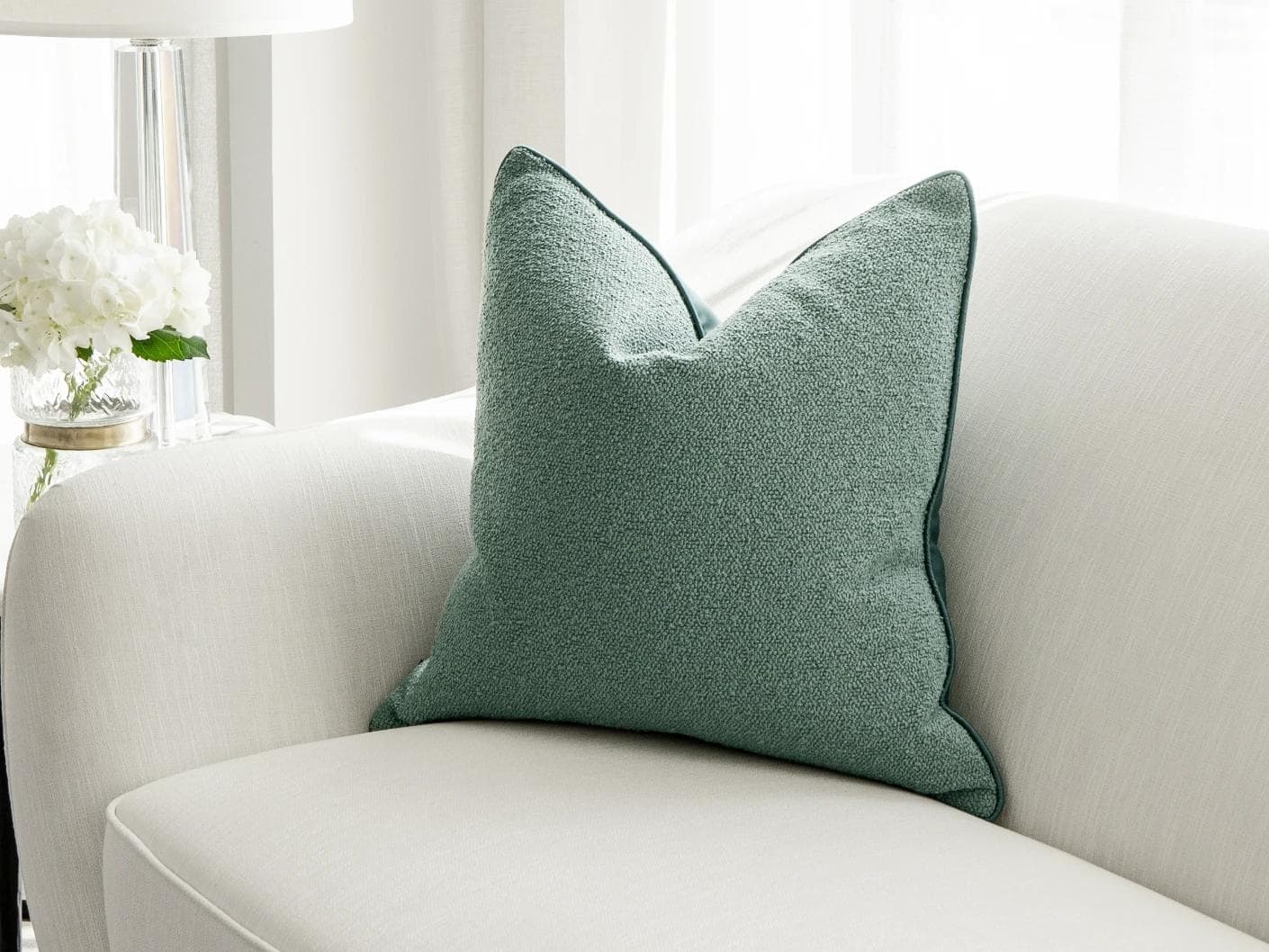 Oliver Sage cushion in green, shown in a lifestyle right view as image 2