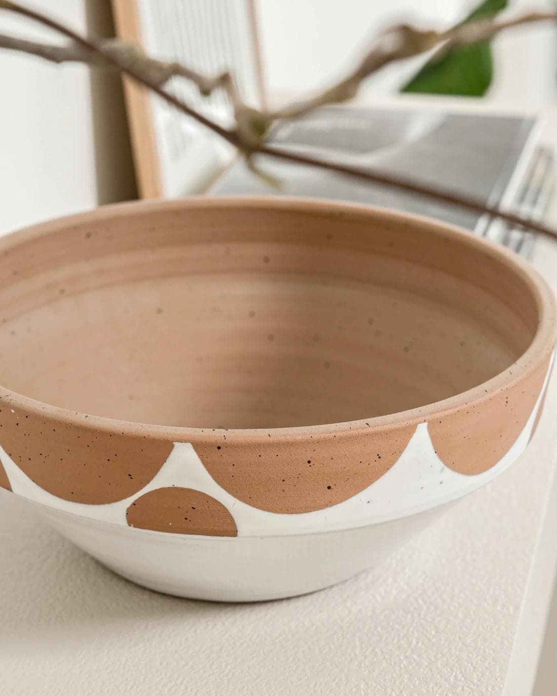 Oris Terra bowls in soft ivory, beige and white, shown in a lifestyle close-up top view as image 4