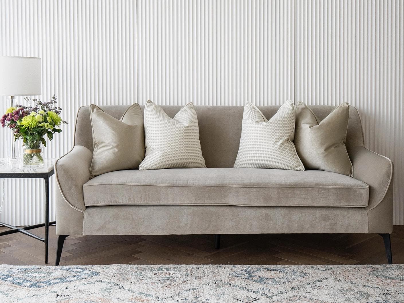 Adeline Bundle cushion in gold, beige and white, shown in a lifestyle front view as image 2