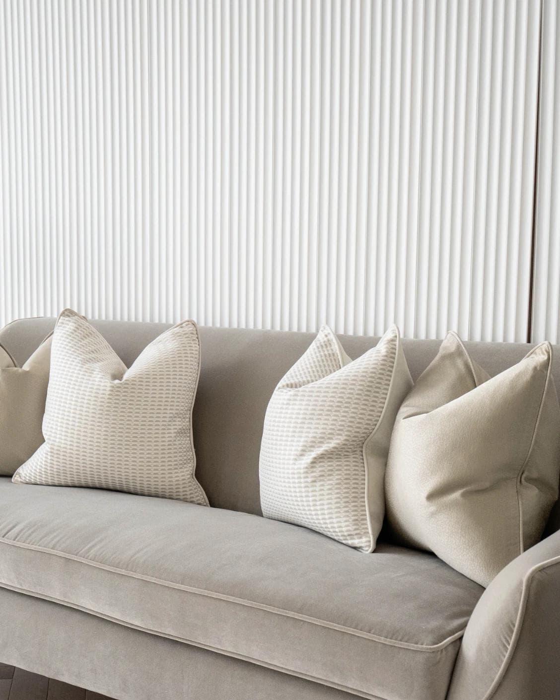 Adeline Bundle cushion in gold, beige and white, shown in a lifestyle right view as image 4