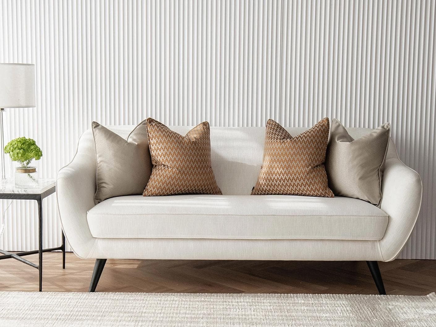 Amalia Bundle cushion in gold, orange and beige, shown in a lifestyle front view as image 4