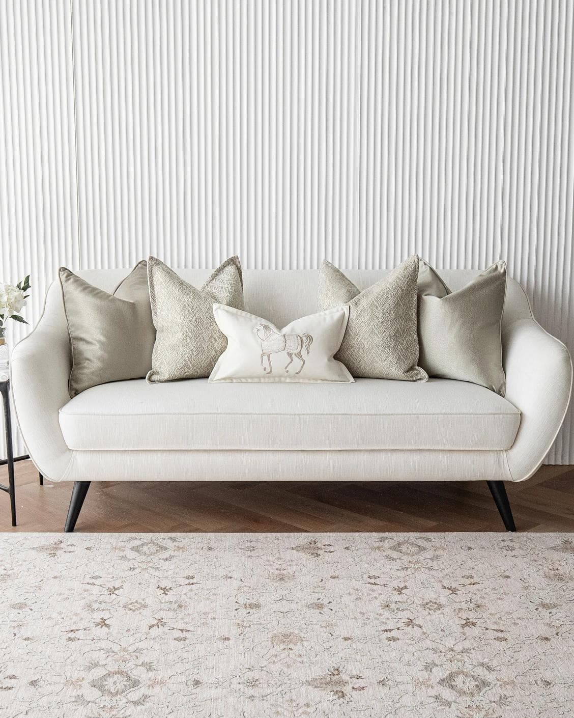 Sugar Bundle cushion in gold, beige and white, shown in a lifestyle front view as image 4