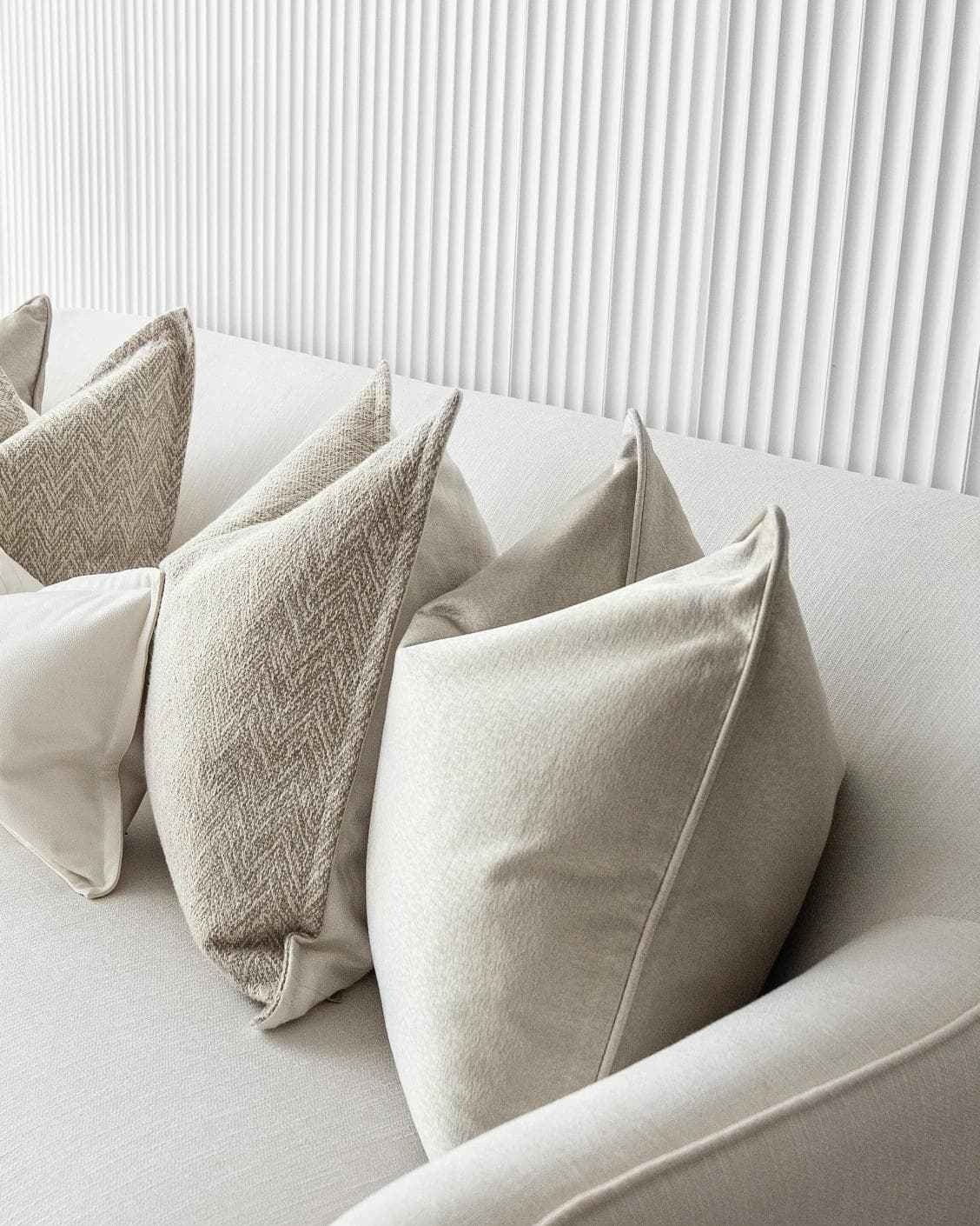 Sugar Bundle cushion in gold, beige and white, shown in a product right view as image 8