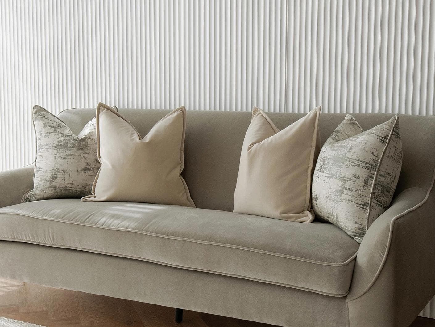 Jennica Bundle cushion in beige, grey and white, shown in a lifestyle right view as image 2