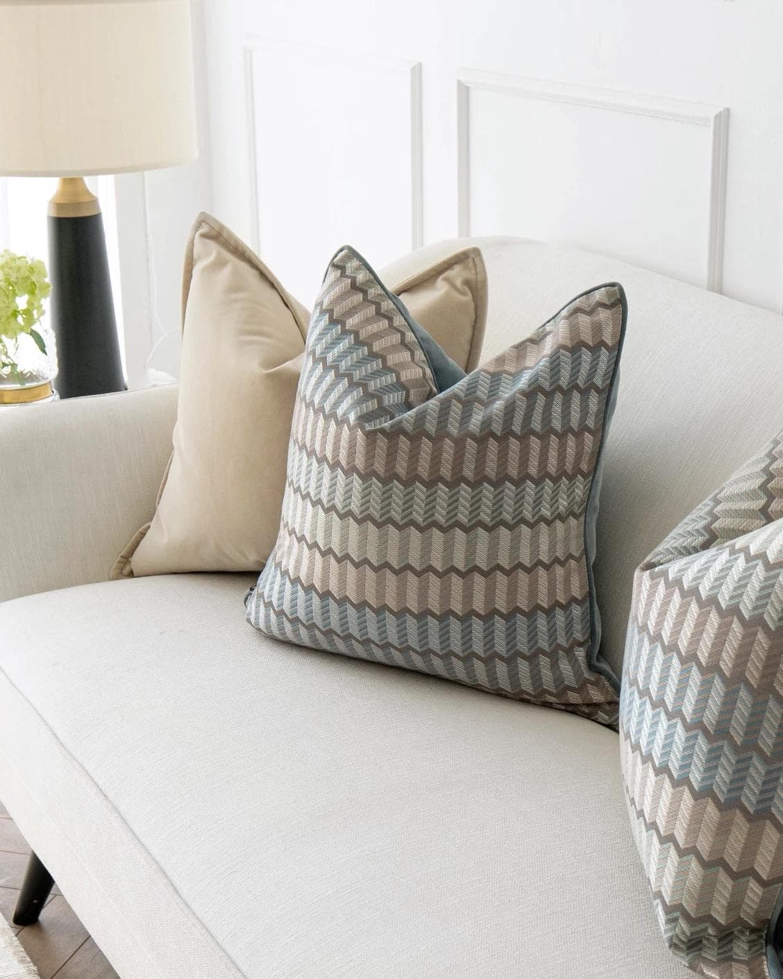 Nilla Bundle cushion in silver, blue and beige, shown in a product right view as image 5