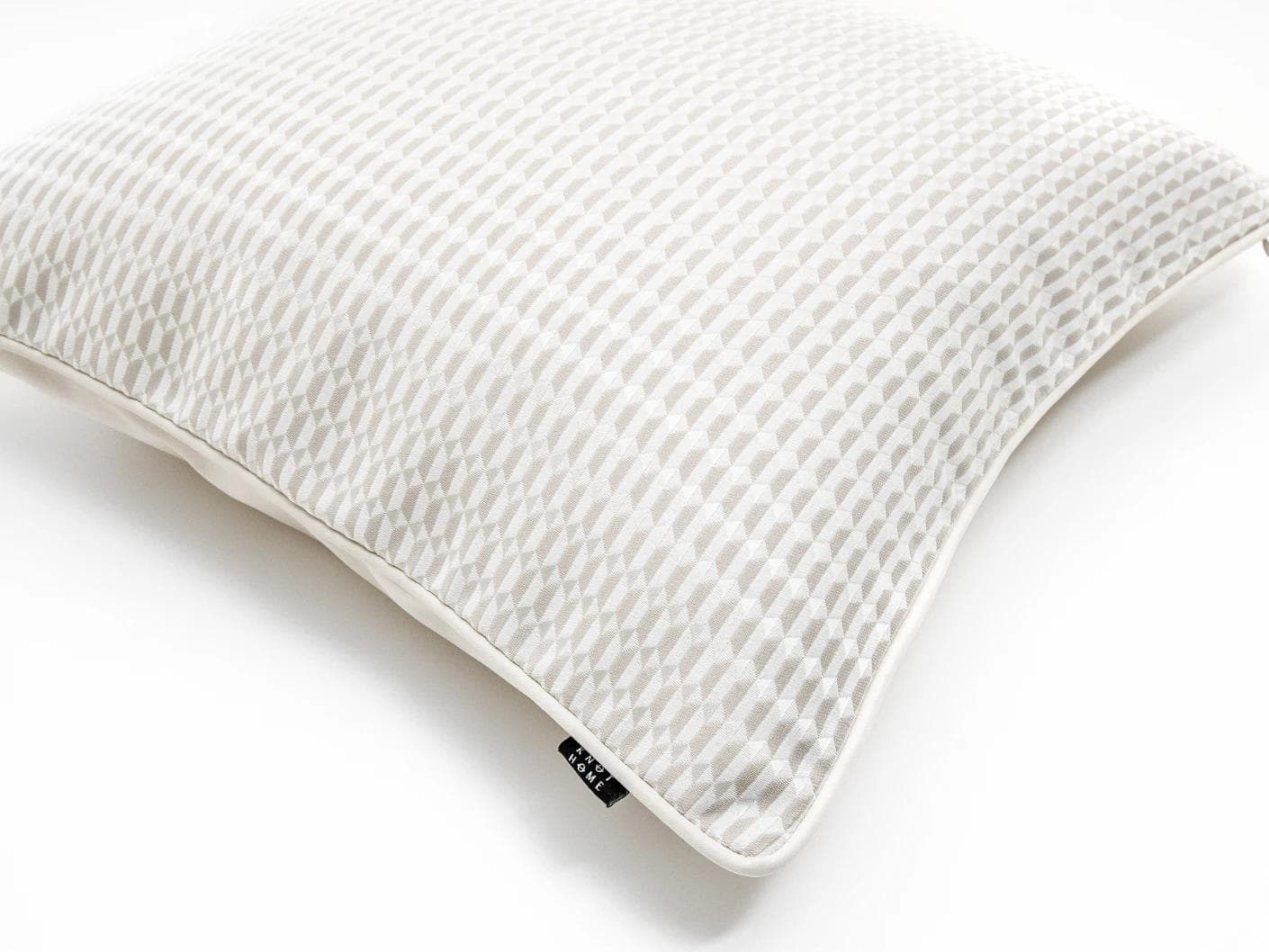 Paola Laurent cushion in white and beige, shown in a product top view as image 7