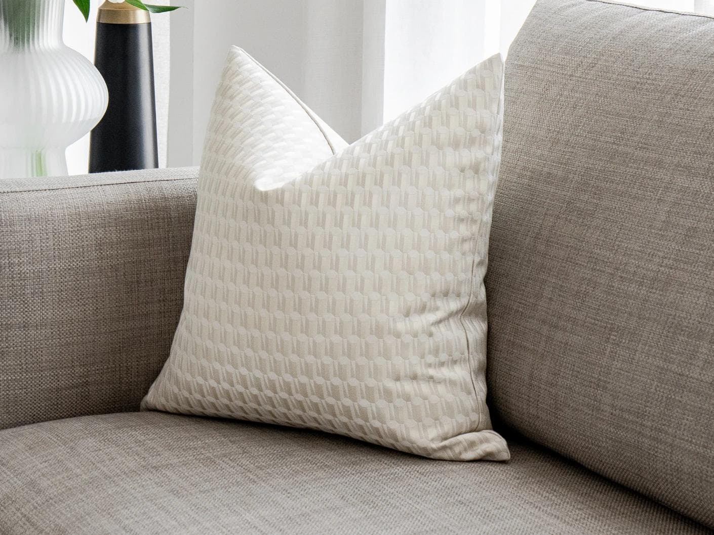 Paul Bianca cushion in white and beige, shown in a lifestyle as image 2