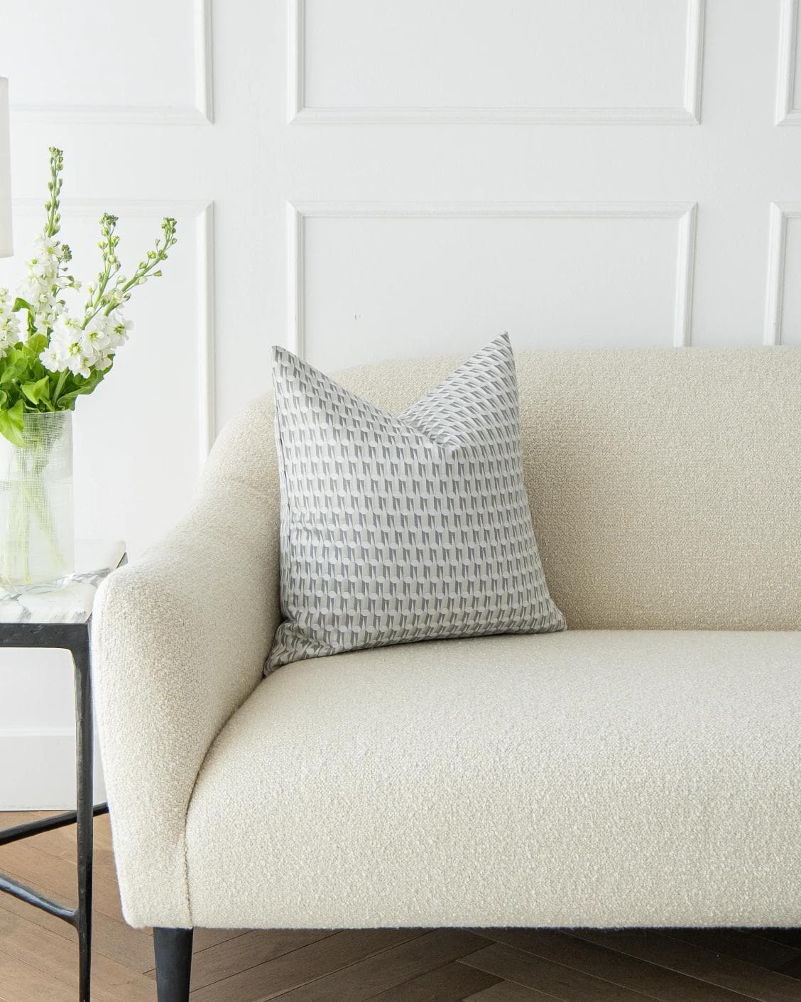 Paul Canova cushion in grey, shown in a lifestyle front view as image 4