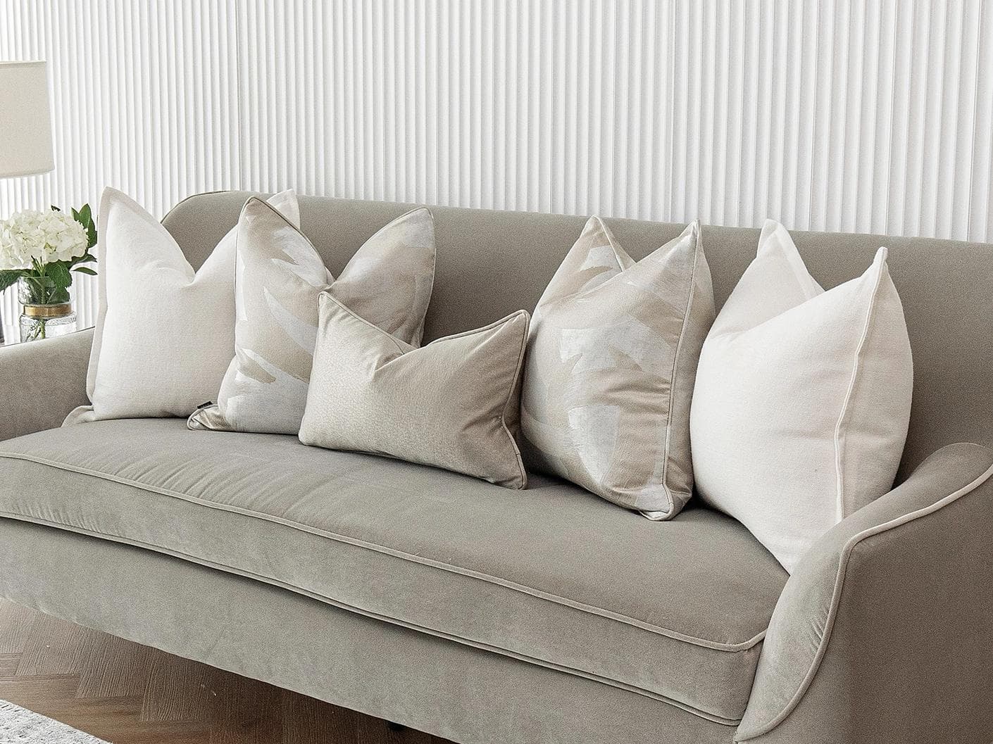 Harry Bundle cushion in gold, beige, silver and white, shown in a lifestyle right view as image 5