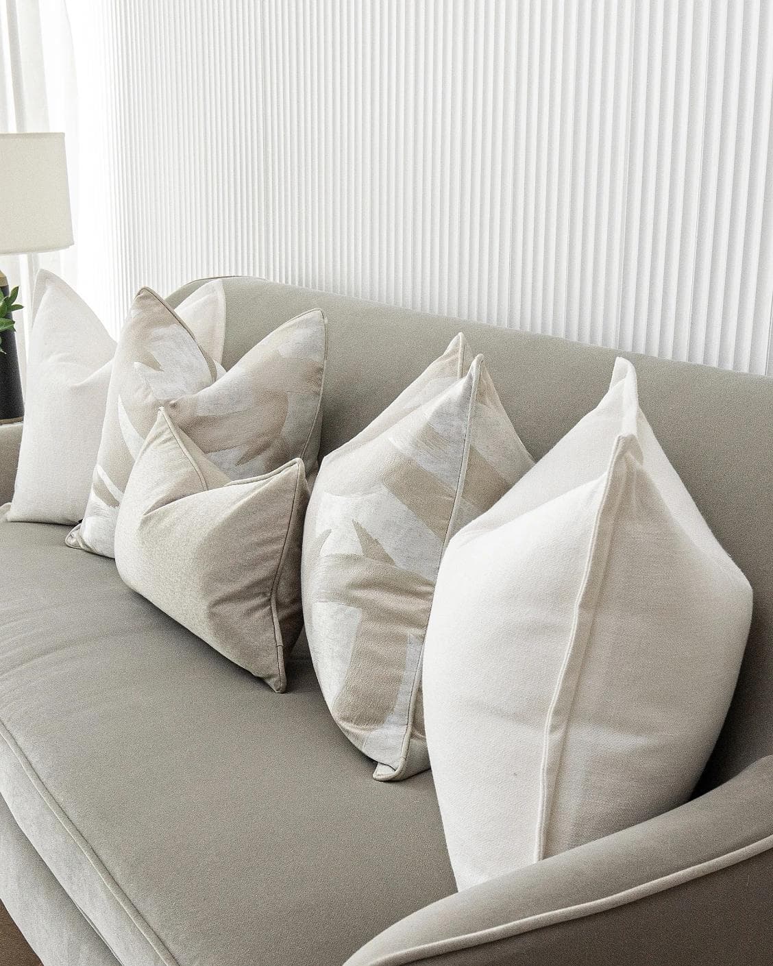 Harry Bundle cushion in gold, beige, silver and white, shown in a product right view as image 8