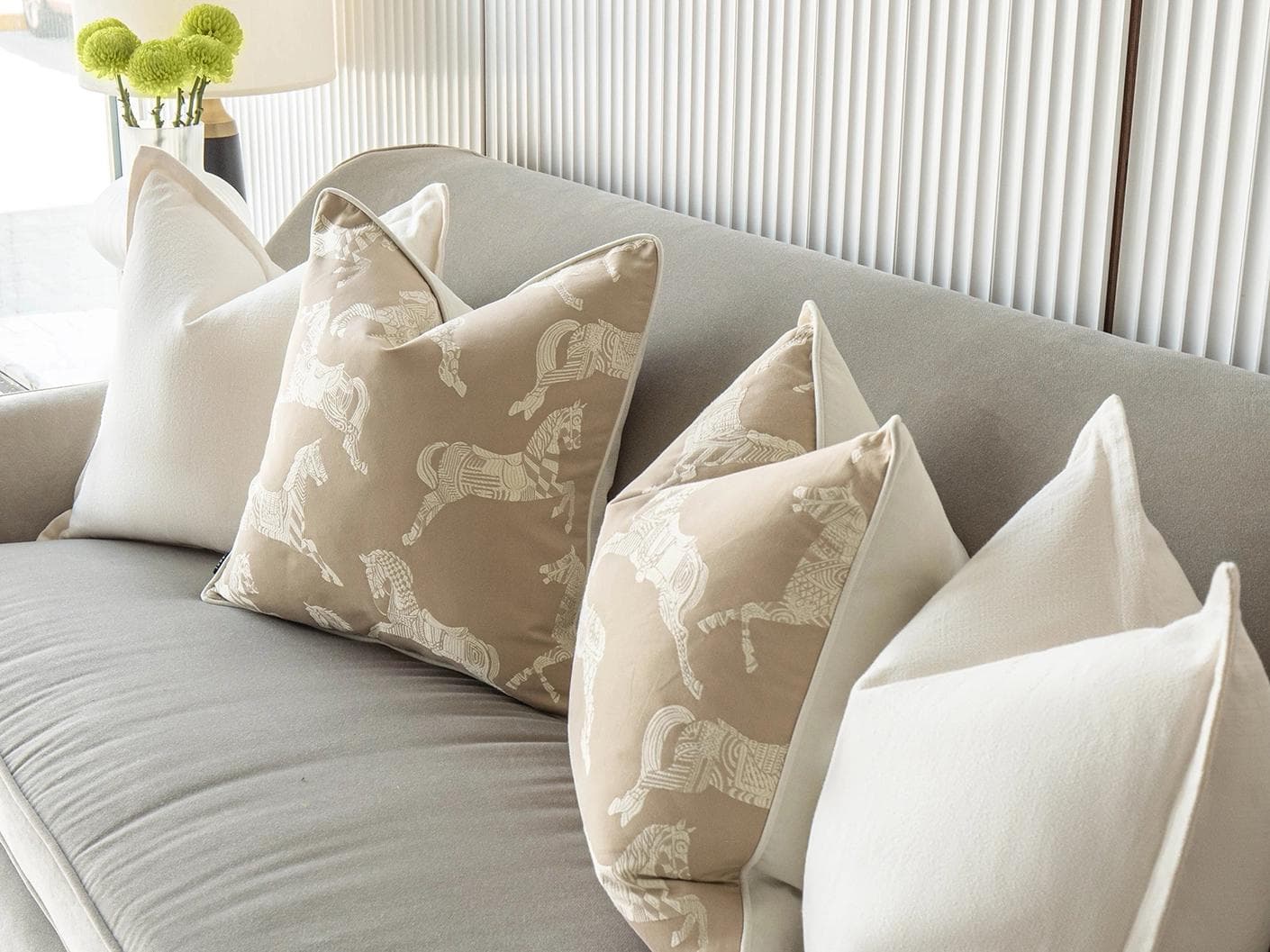 Michael Bundle cushion in white and beige, shown in a lifestyle right view as image 5