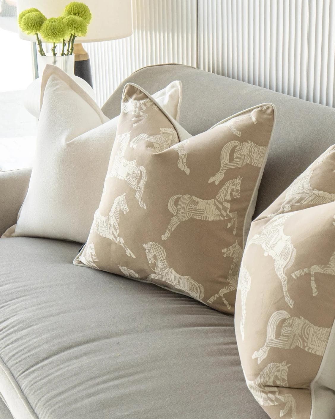 Michael Bundle cushion in white and beige, shown in a lifestyle right view as image 5