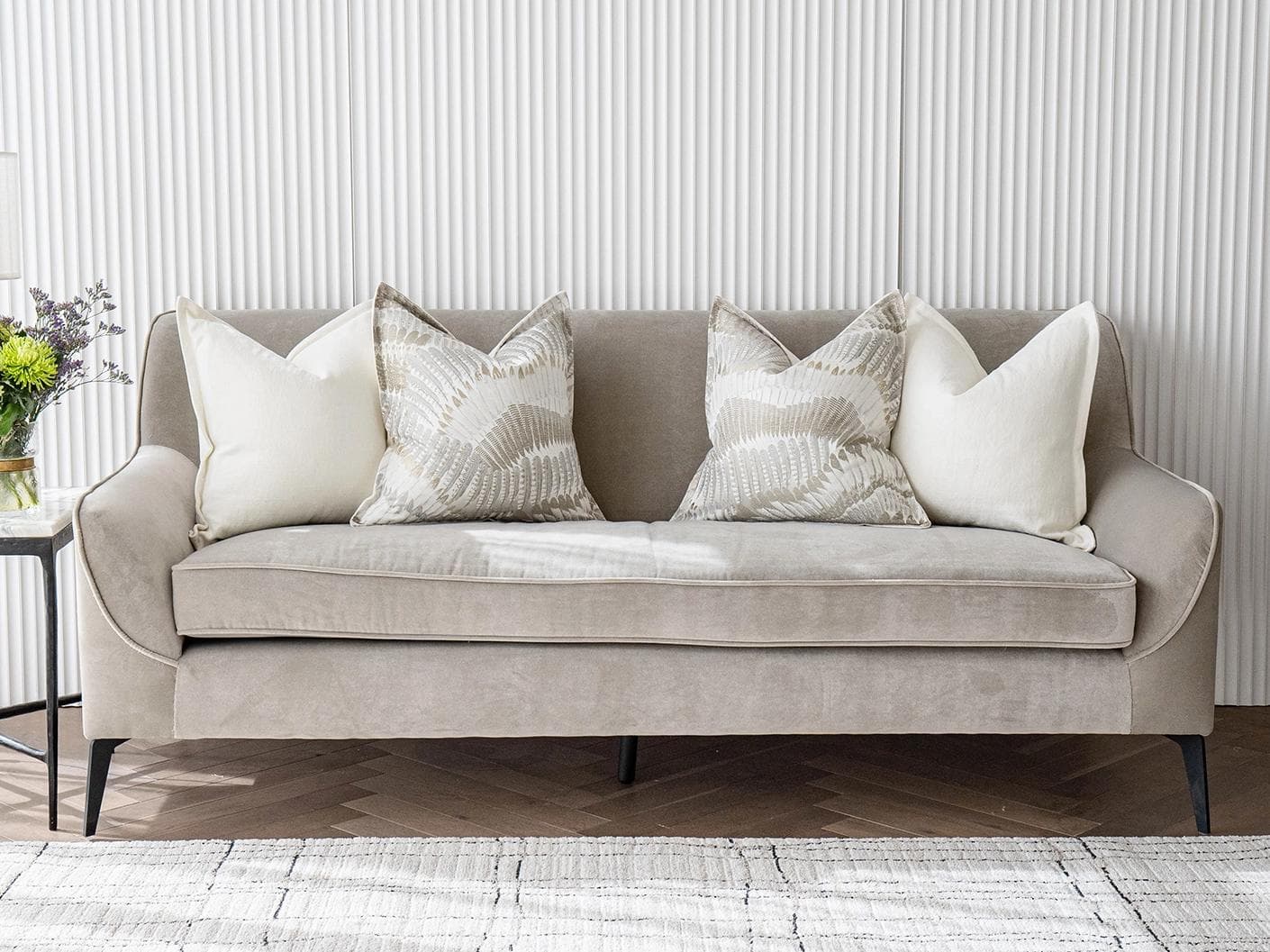 Stella Bundle cushion in white, brown and grey, shown in a lifestyle front view as image 4