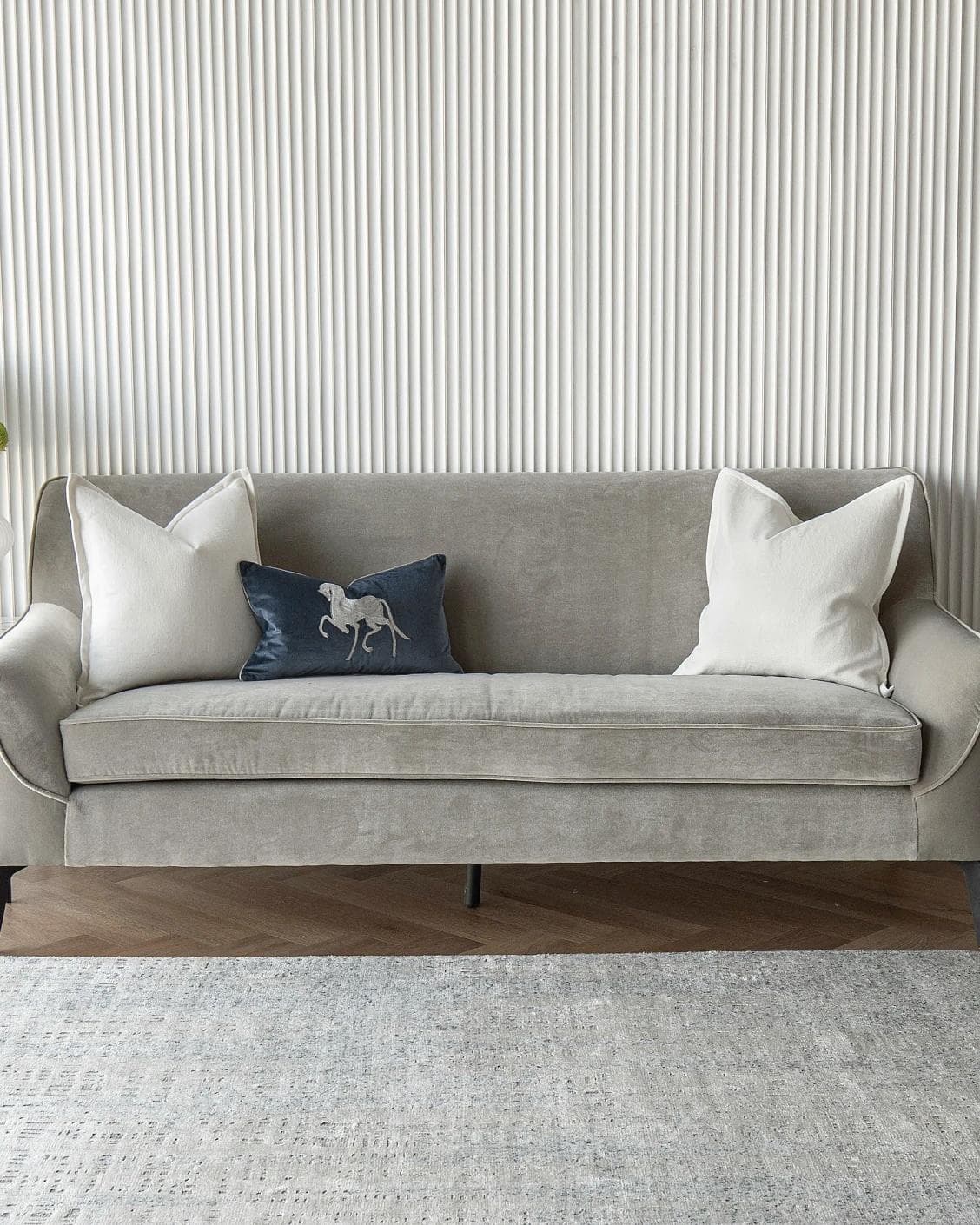 Brent Bundle cushion in white, blue and silver, shown in a lifestyle front view as image 4