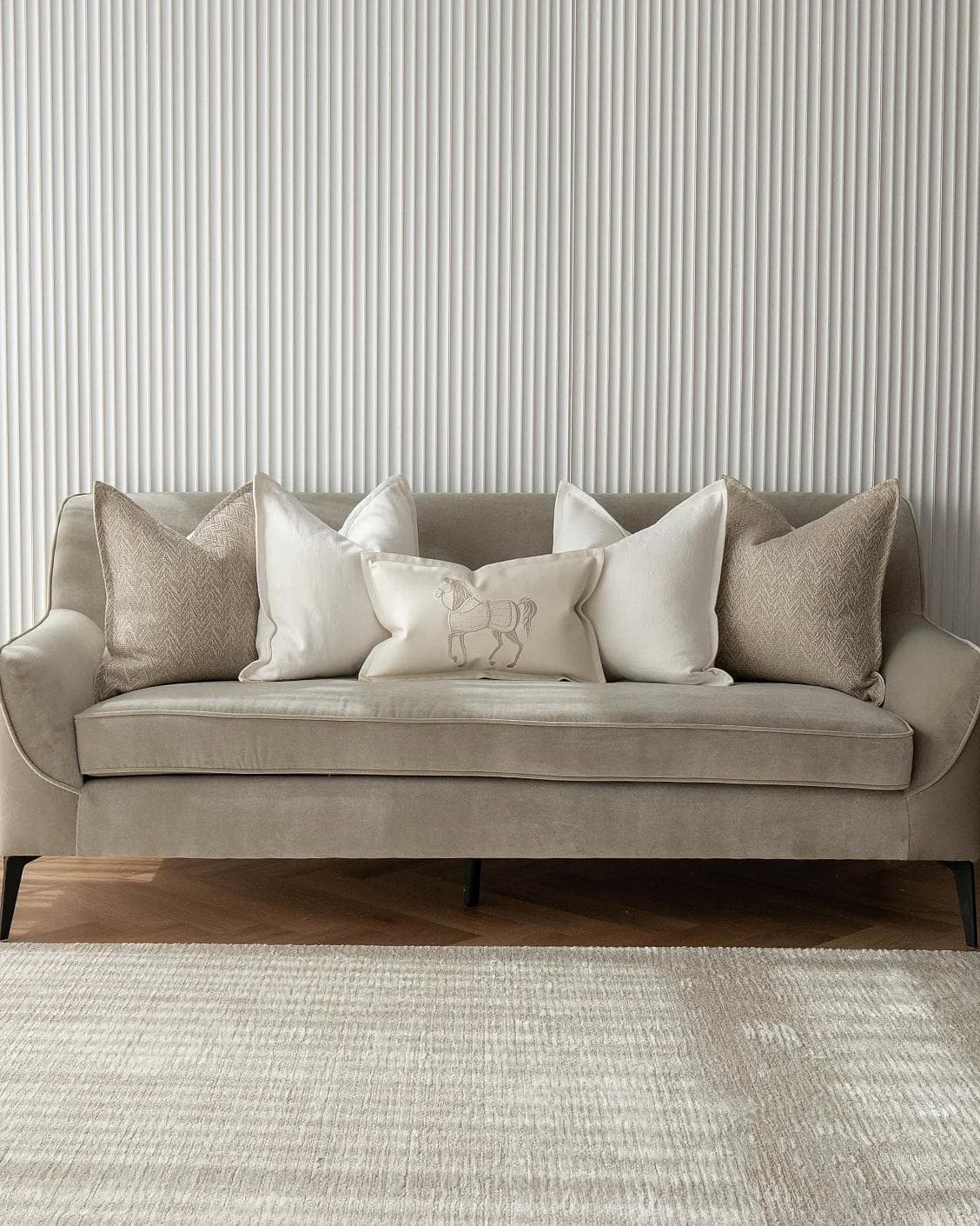 Antonio Bundle cushion in white and beige, shown in a lifestyle front view as image 4
