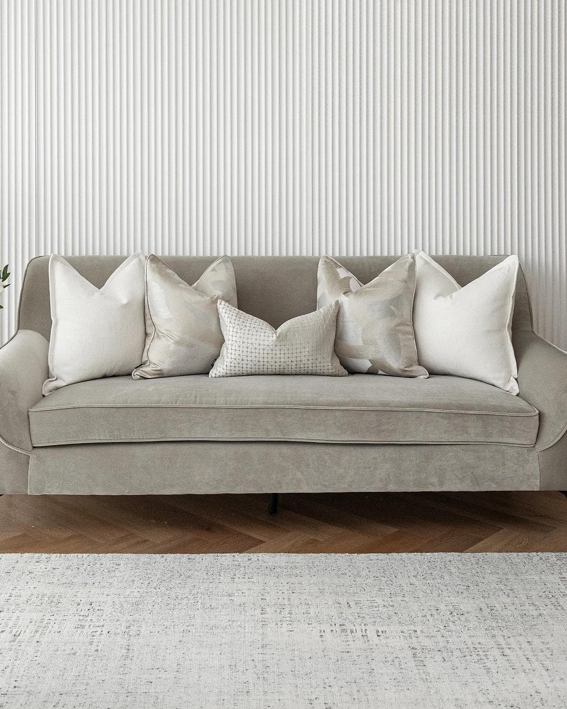 Jose Bundle cushion in white, silver and beige, shown in a lifestyle front view as image 2