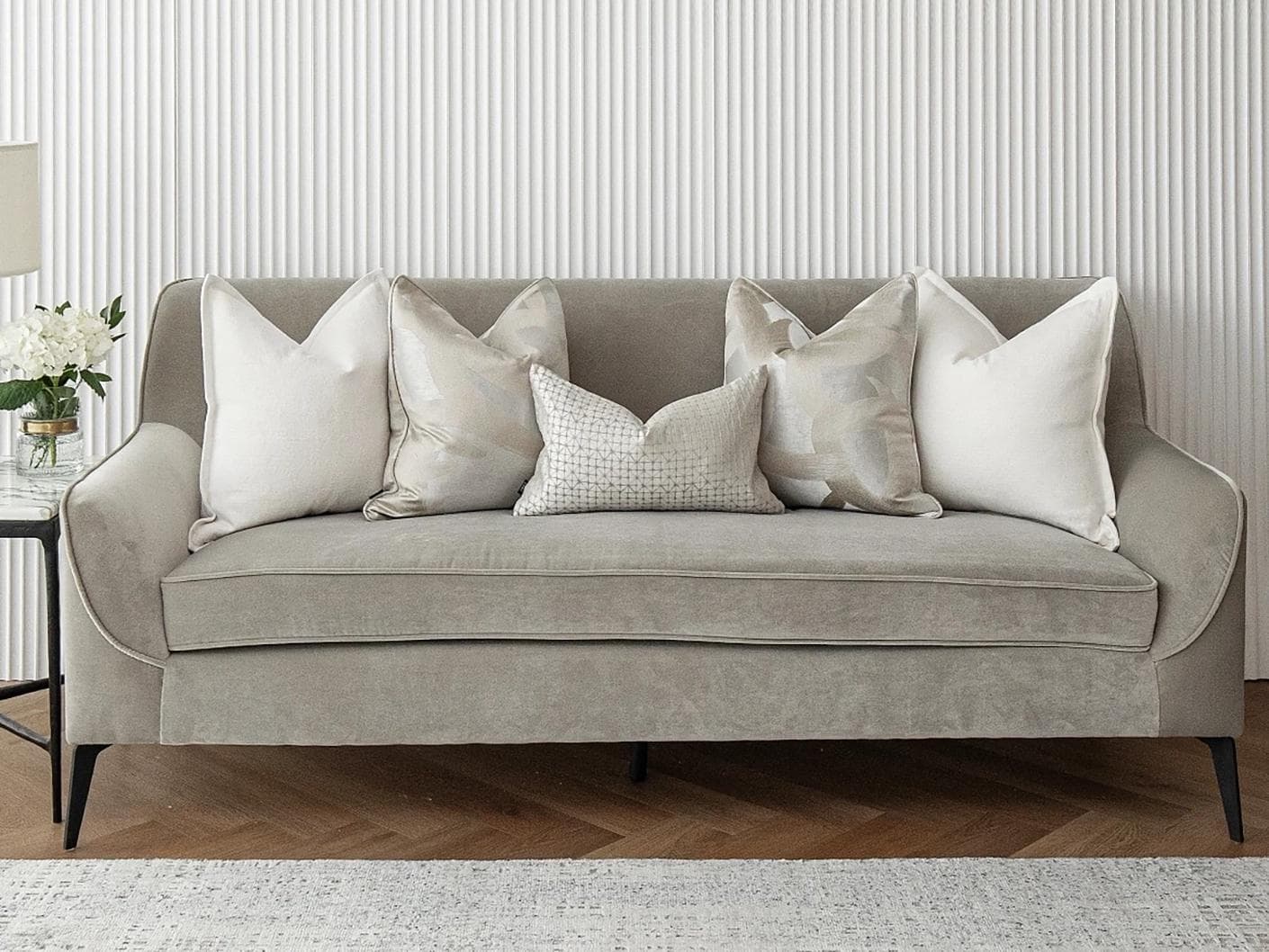 Jose Bundle cushion in white, silver and beige, shown in a lifestyle front view as image 2