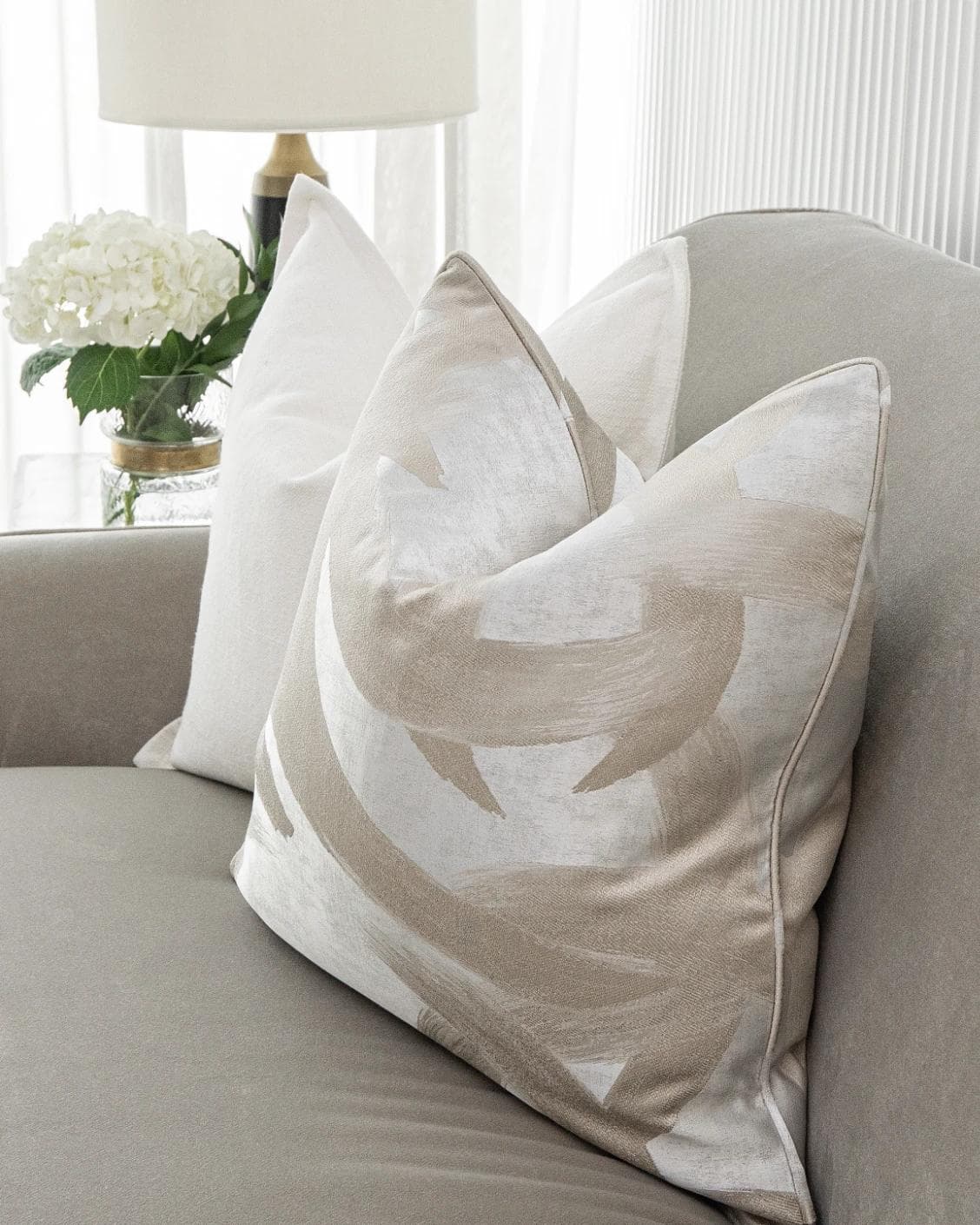 Jose Bundle cushion in white, silver and beige, shown in a lifestyle right view as image 5