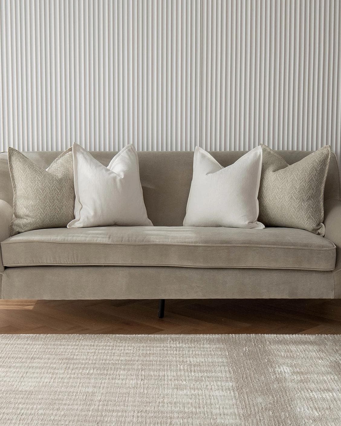 Matteo Bundle cushion in white and beige, shown in a lifestyle front view as image 4