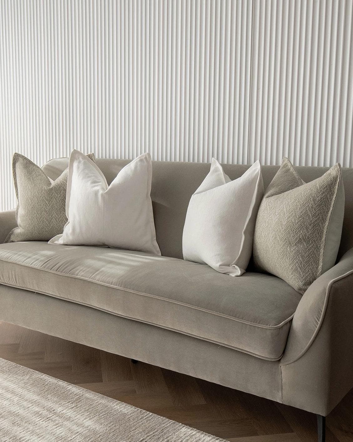 Matteo Bundle cushion in white and beige, shown in a lifestyle right view as image 2