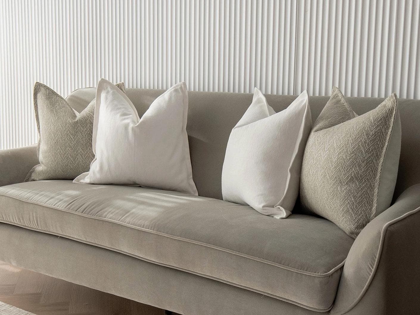 Matteo Bundle cushion in white and beige, shown in a lifestyle right view as image 2