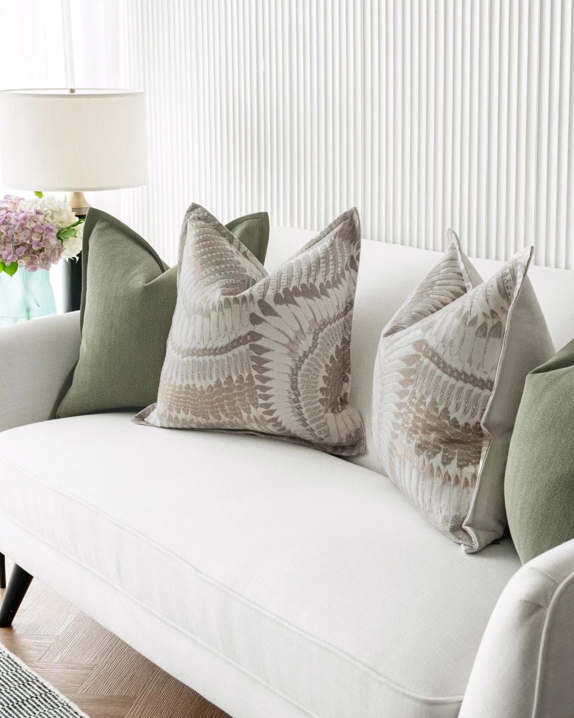 Quentin Bundle cushion in green, brown and grey, shown in a lifestyle right view as image 5