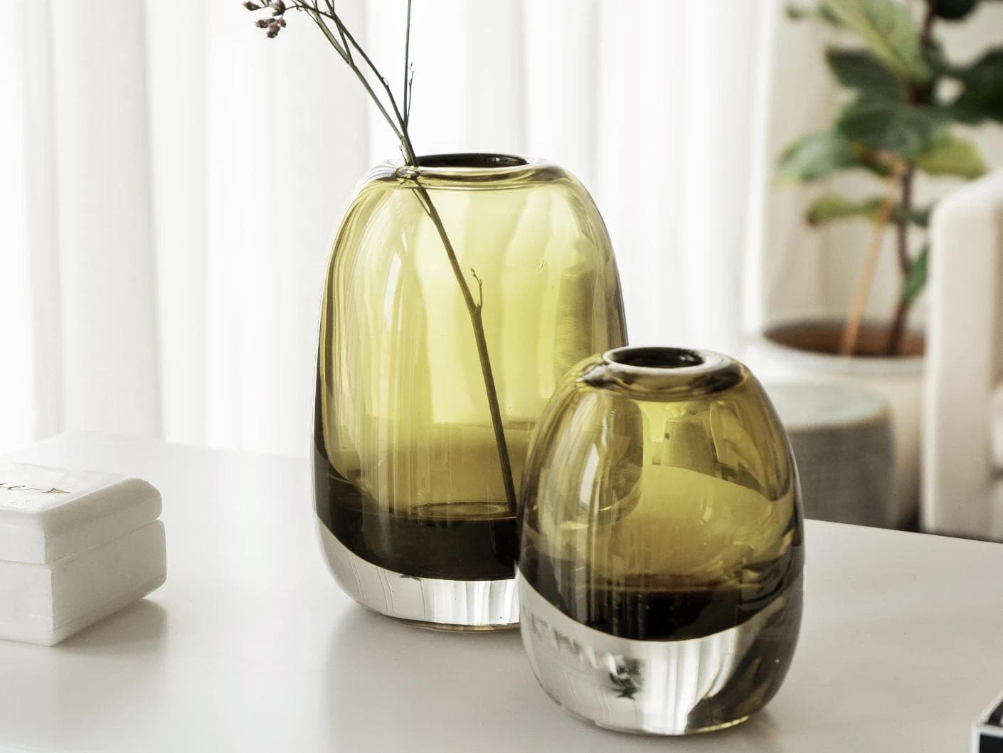 Rainier Storms vases in yellow, shown in a lifestyle right view as image 2