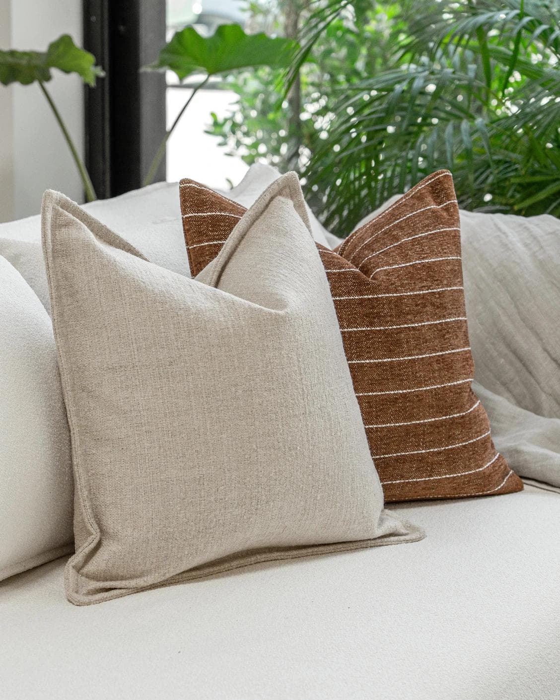Ranjith Bundle cushion in beige and brown, shown in a product left view as image 5