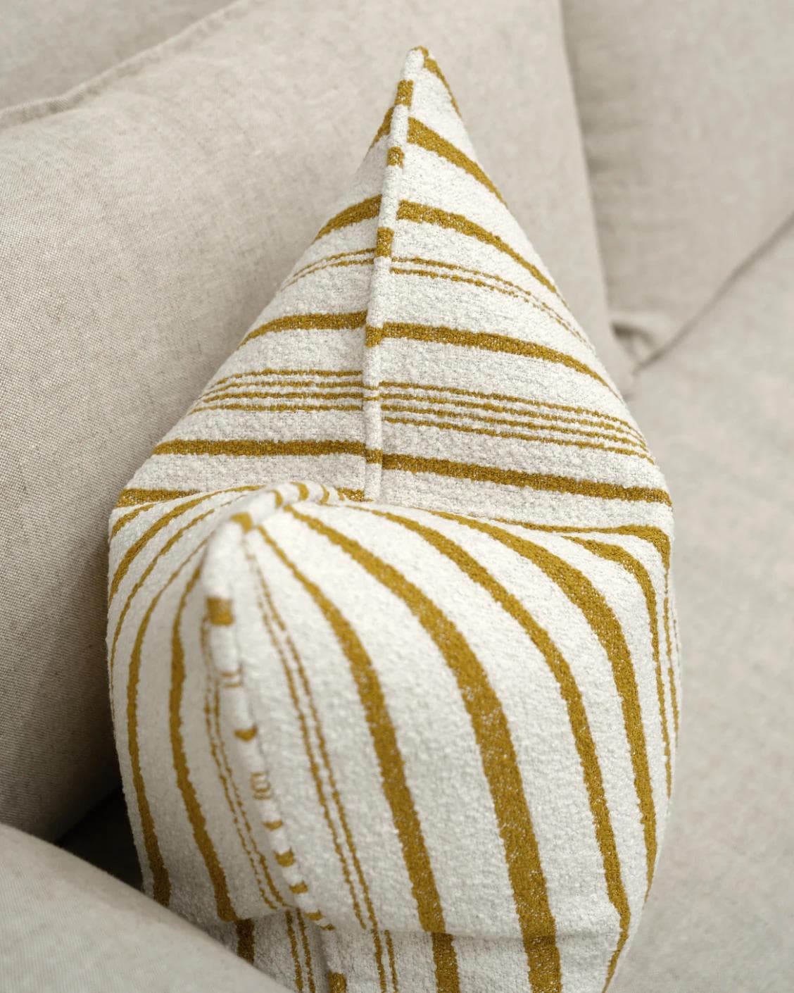 Raya Klimt cushion in ivory, shown in a lifestyle top view as image 5
