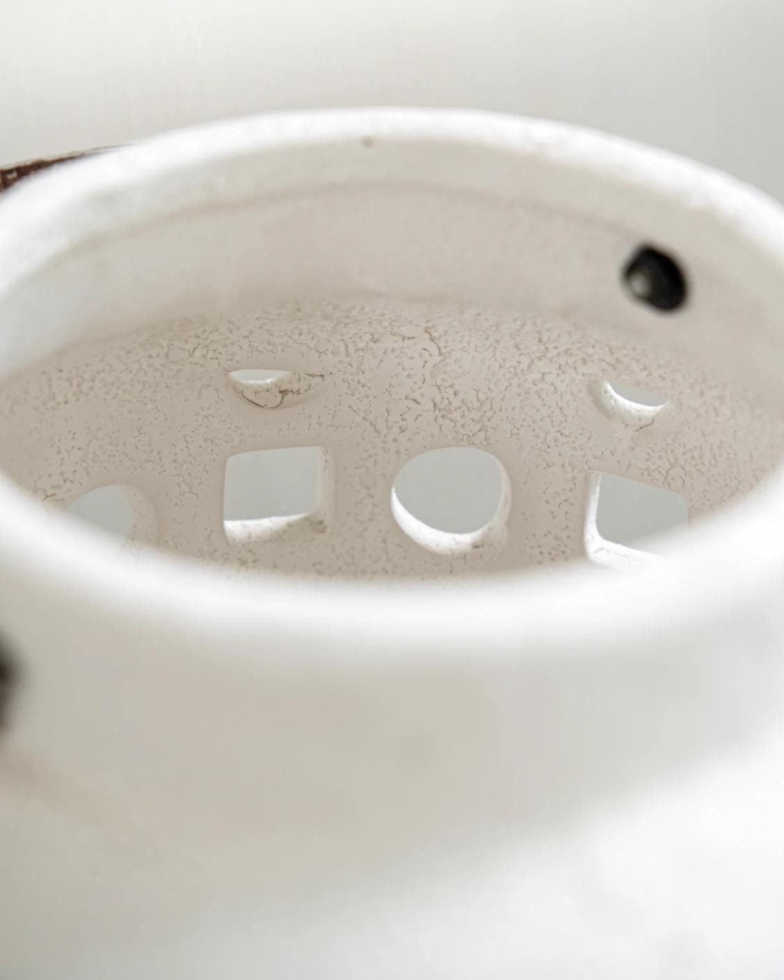 Reba Terra candle holders in soft ivory and ivory, shown in a product close-up as image 5
