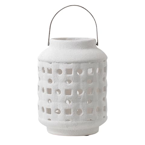 Reba Terra candle holders in soft ivory and ivory, shown in a product front view as image 1