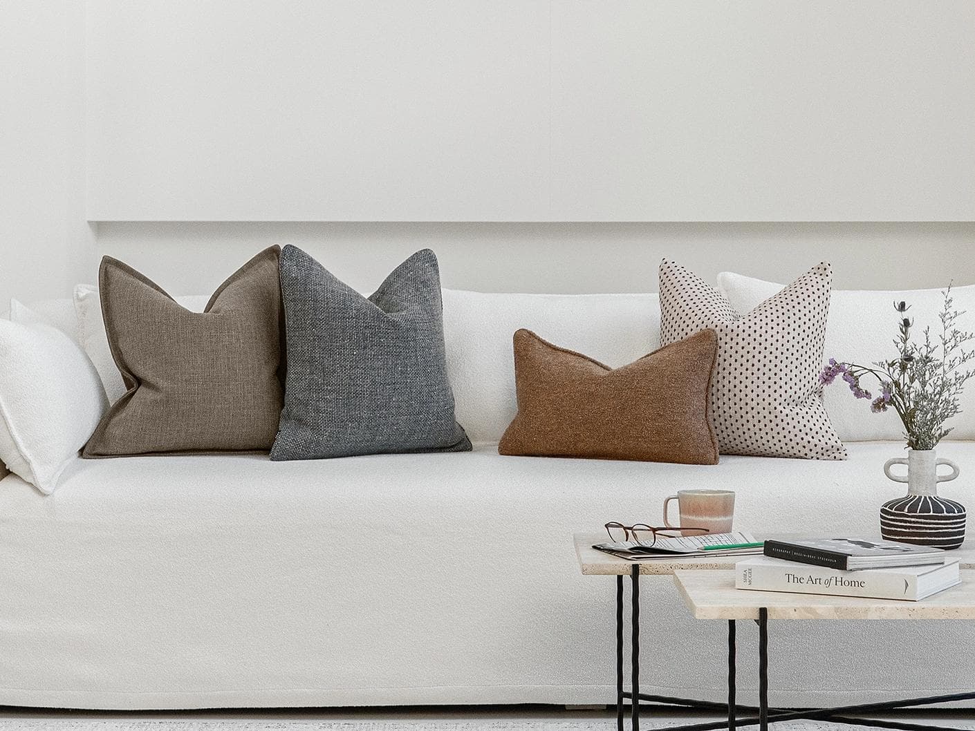 Rebecca Bundle cushion, shown in a lifestyle front view as image 4