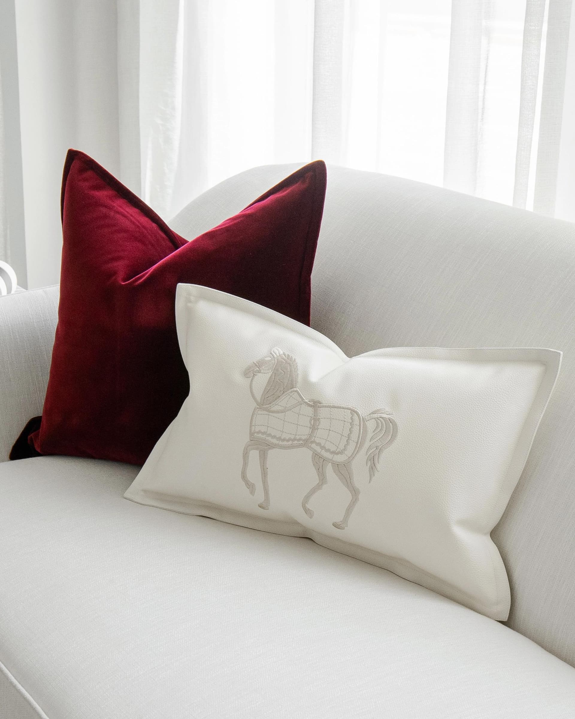 Garnet Bundle cushion in red, shown in a product right view as image 6