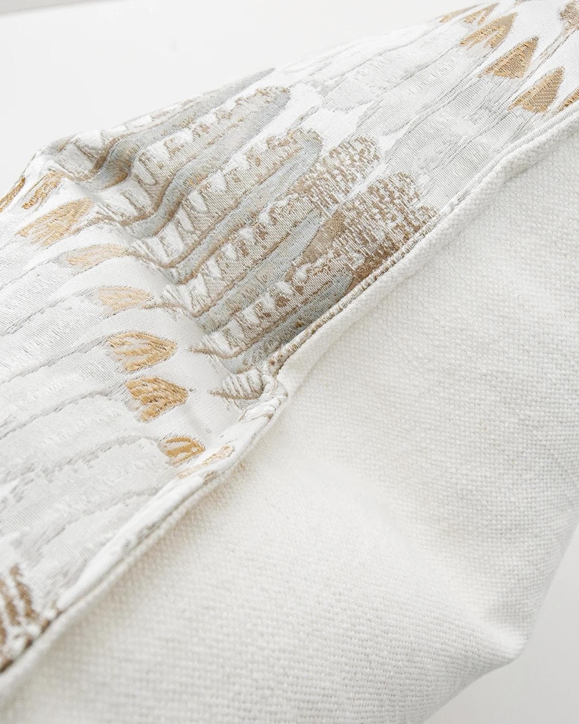 Reesha Bianca cushion in brown and grey, shown in a product top view as image 8