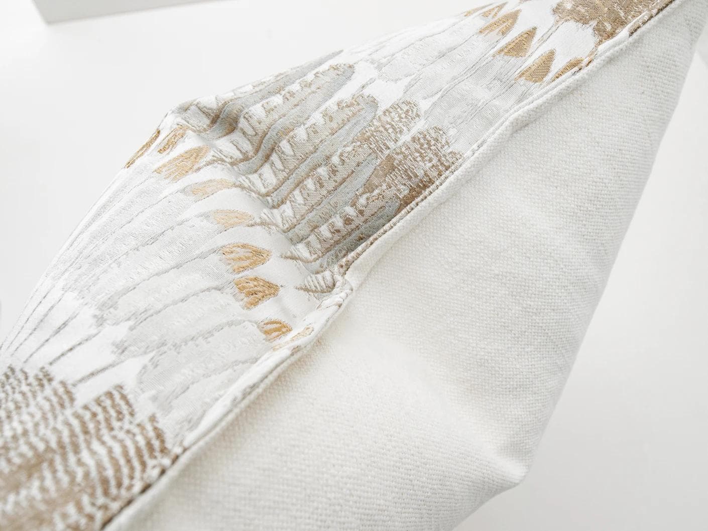 Reesha Bianca cushion in brown and grey, shown in a product top view as image 8