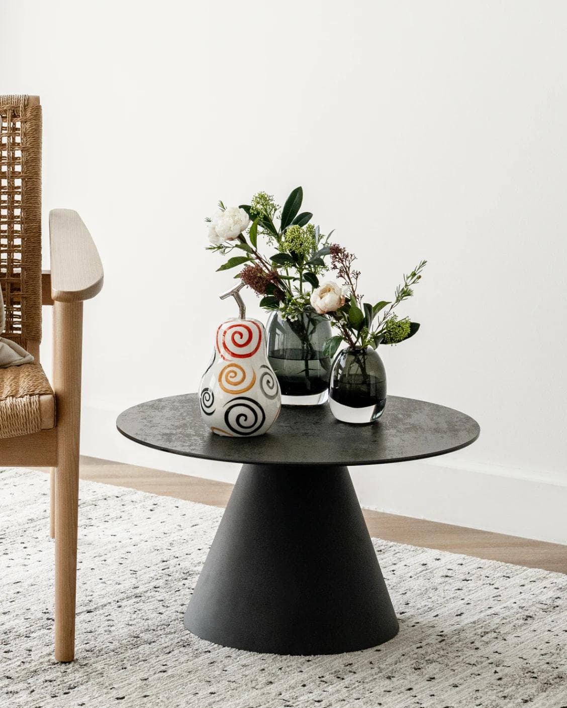Rhea Arneson statues and sculptures in white, black and red, shown in a lifestyle front view as image 2