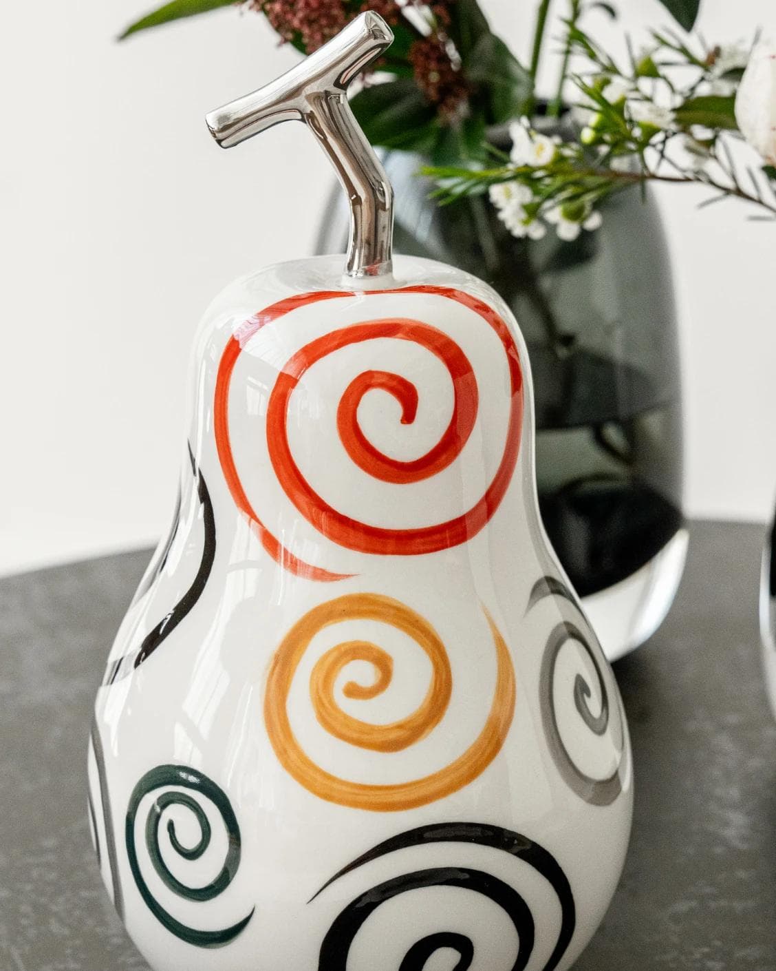 Rhea Arneson statues and sculptures in white, black and red, shown in a lifestyle front view as image 5
