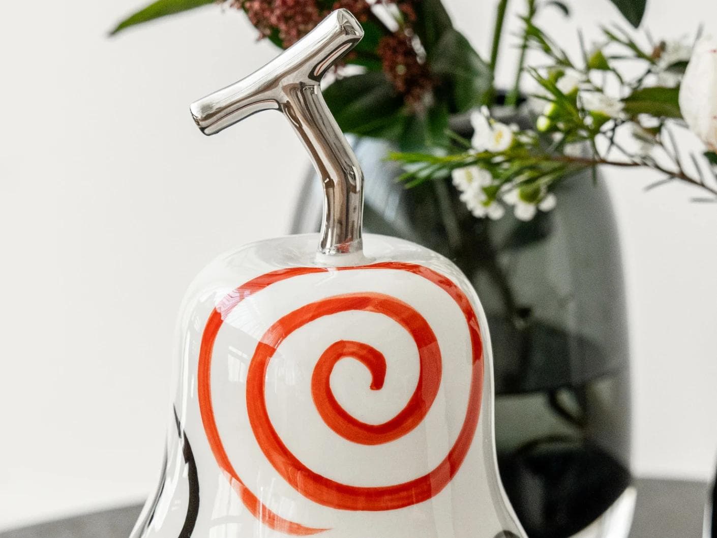 Rhea Arneson statues and sculptures in white, black and red, shown in a lifestyle front view as image 5