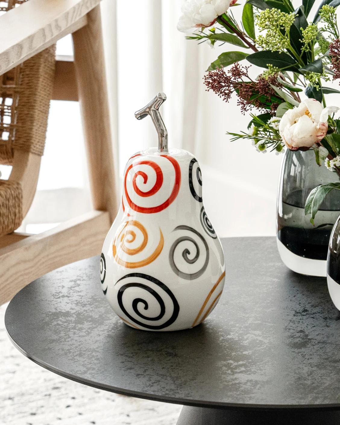 Rhea Arneson statues and sculptures in white, black and red, shown in a lifestyle right view as image 6