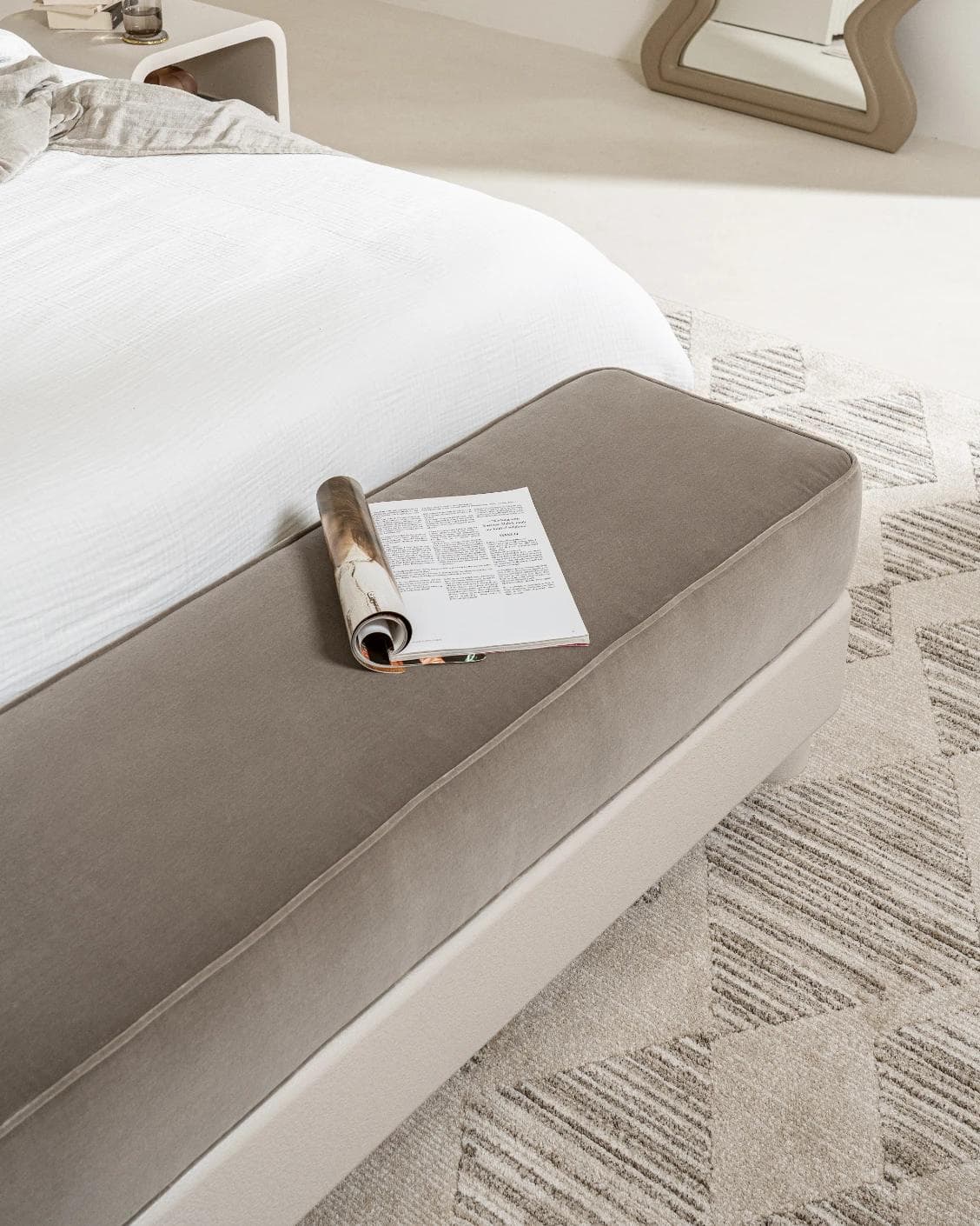 Rina bench in warm taupe, ivory and taupe, shown in a lifestyle top view as image 9